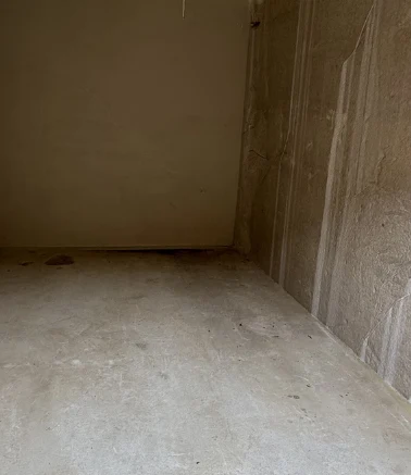 The same storage unit completely emptied and swept after the cleanout